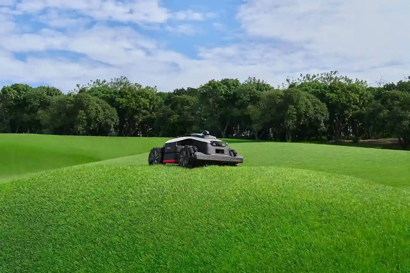 Dreame remote lawn mower with full-time 4WD wheels on sloped terrain