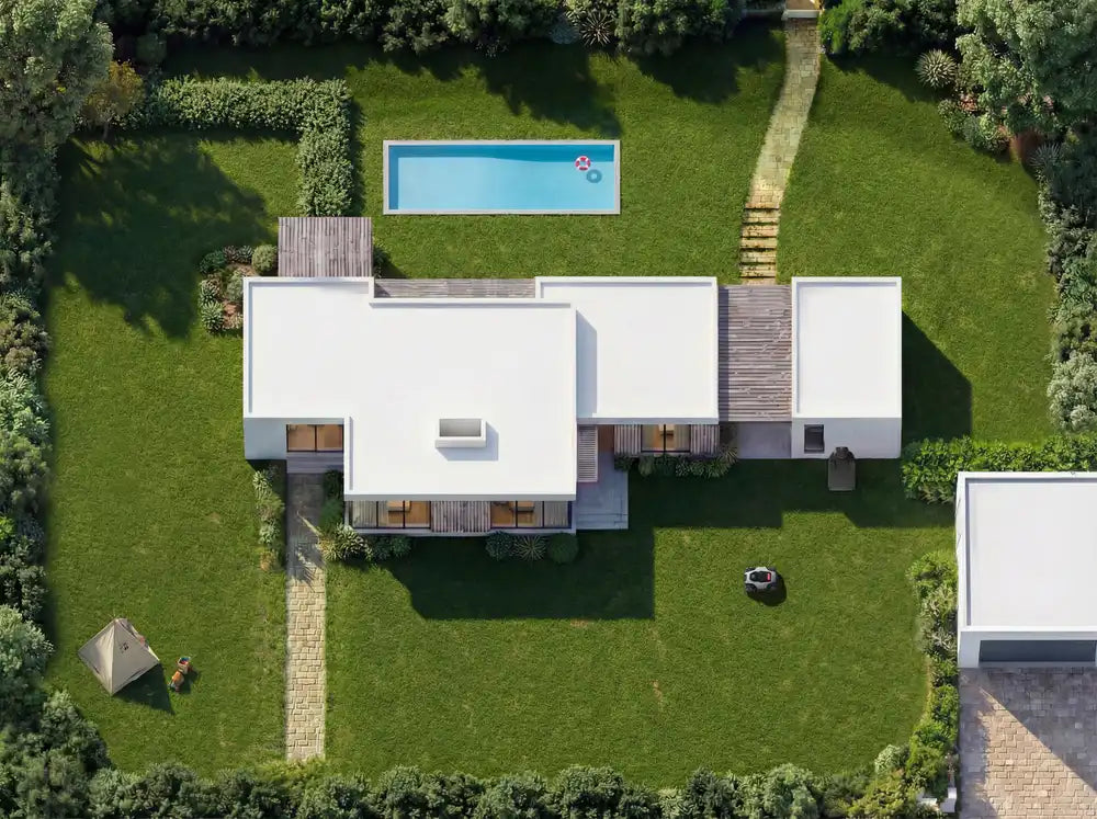 Aerial view of a robot lawn mower mowing a half-acre lawn with separate front and back yard zones.