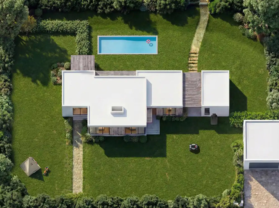 Aerial view of a robot lawn mower mowing a half-acre lawn with separate front and back yard zones.