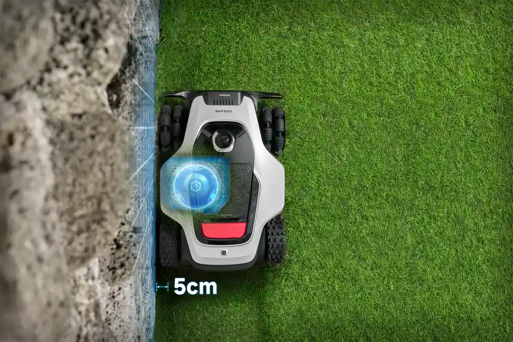 EdgeMaster 2.0 precision edge cutting on a robot grass cutter trimming close to a fence