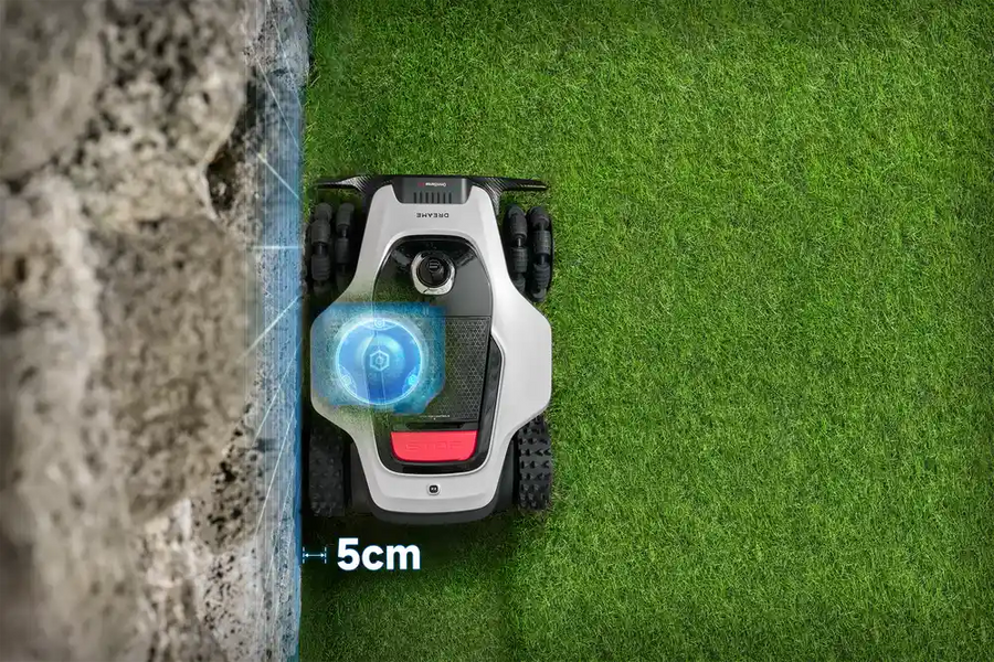 EdgeMaster 2.0 precision edge cutting on a robot grass cutter trimming close to a fence
