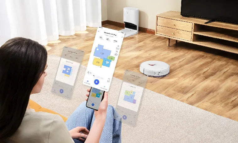 Robot vacuum with mapping cleaning a living room wooden floor.