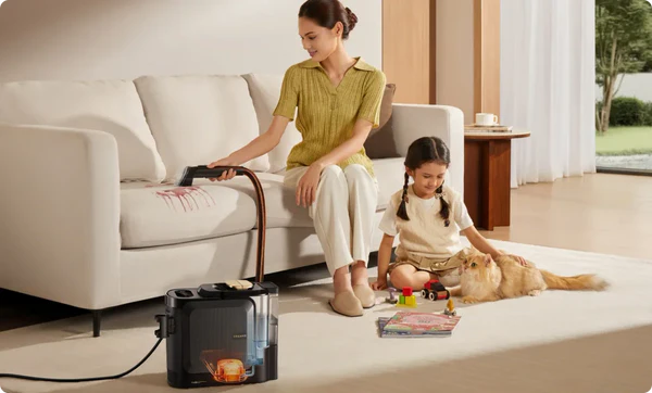 Dreame N20 Steam removing wine, milk, and grease stains from fabric with three water modes.