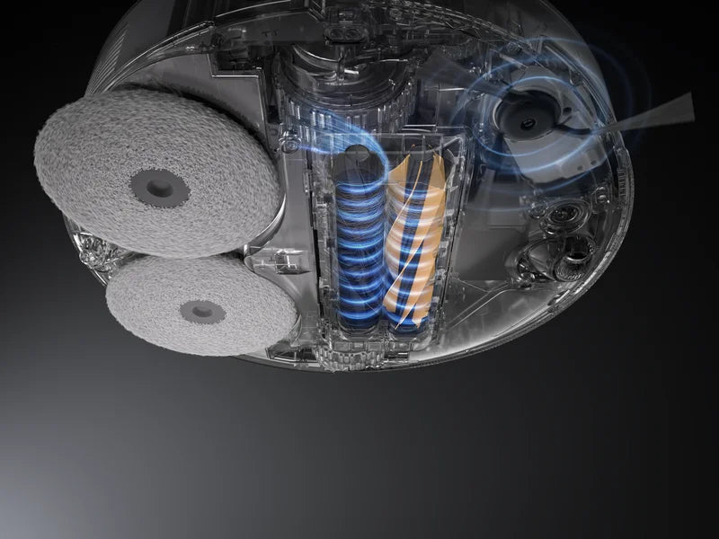 Dreame robot vacuum brush picking up long pet hair without tangling.